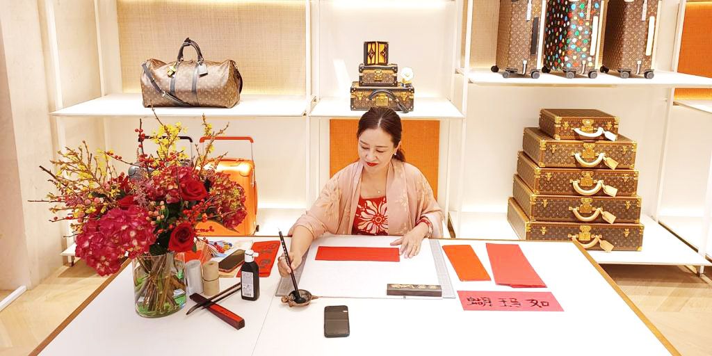 Guzheng Player and Calligrapher Create Luxury Ambience for Louis Vuitton