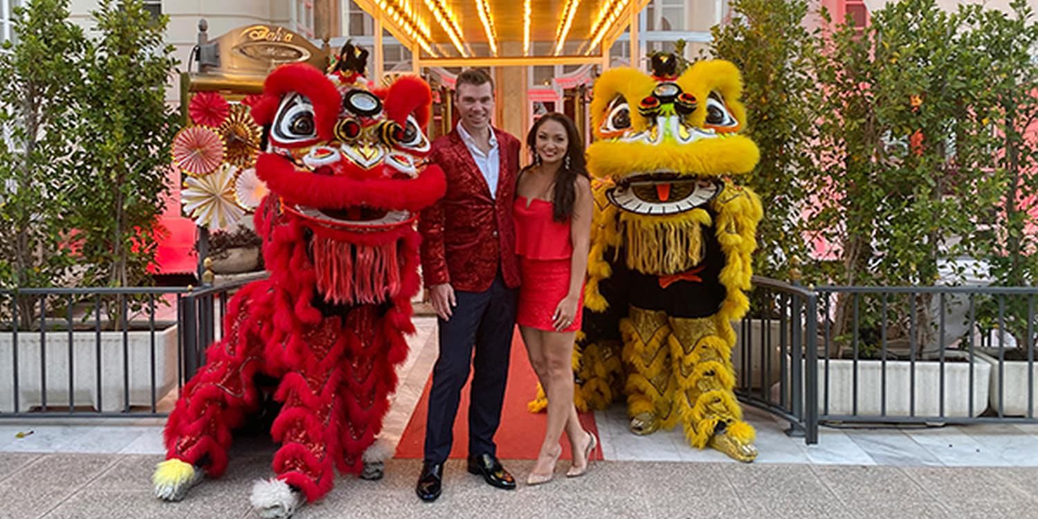 Entertainers perform lion dance during the opening ceremony of the