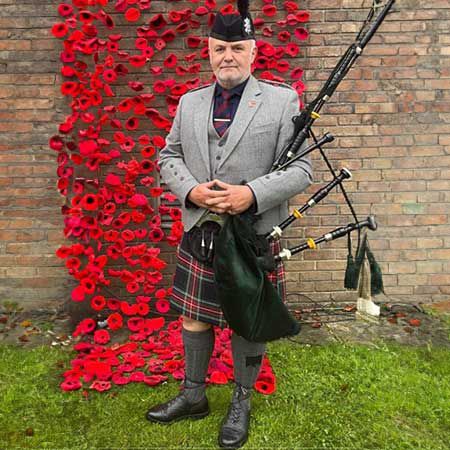 Highland Bagpiper England