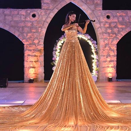 Gold Stilt Violinist Riyadh