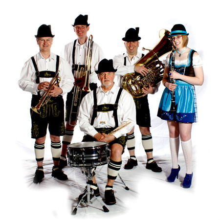 Man playing the tuba in traditional Tyrolean costume, Hamburg]