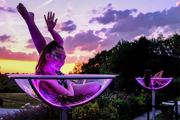 BOOK GIANT MARTINI GLASS PERFORMER IN MIAMI – Event Entertainment Agency  Aerial Artistry