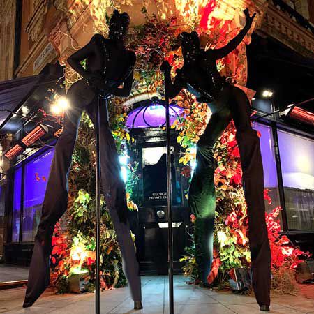 Shadow Stilt Walkers