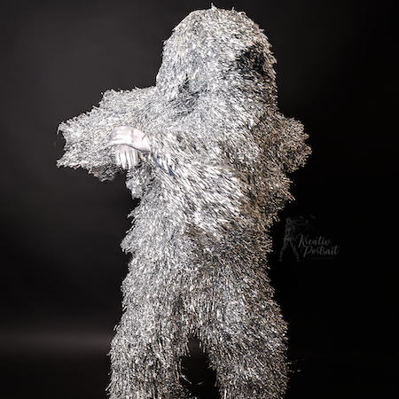 Tinsel Man Walk Act