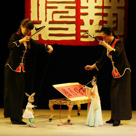 Chinesische Fadenspiel-Puppenshow