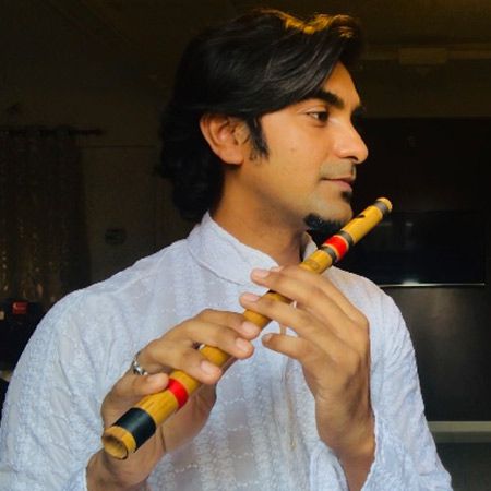 Indian Bamboo Flute Player