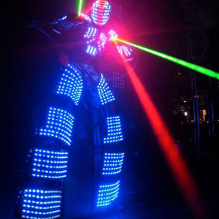 Robot LED su trampoli