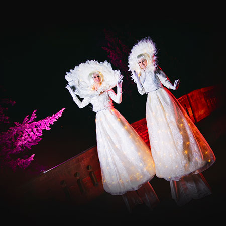 Winter White Stilt Walkers