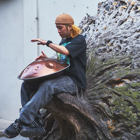 Joueur de Hang Drum de Shanghai