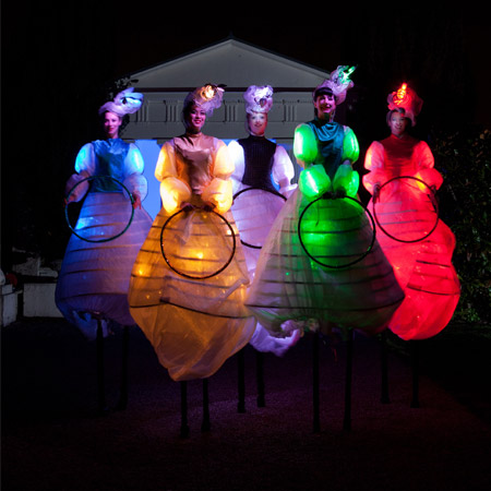 Hire LED Stilt Walkers Book LED Acts Scarlett Entertainment UK