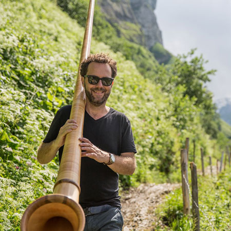 Suonatore di corno alpino Svizzera