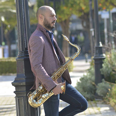 Männlicher Saxophonist Griechenland