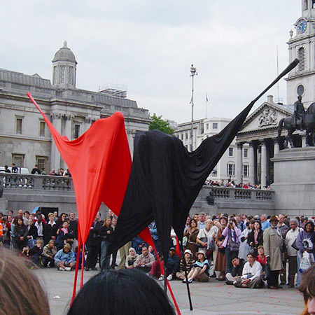 Unique Colourful Stilt Walkers