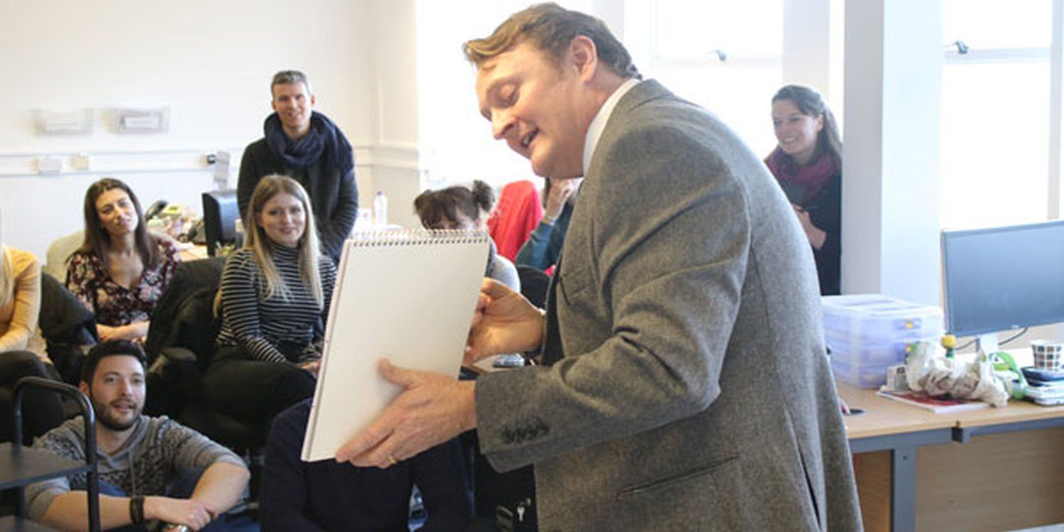 Close Up Magician Impresses Global Head Office