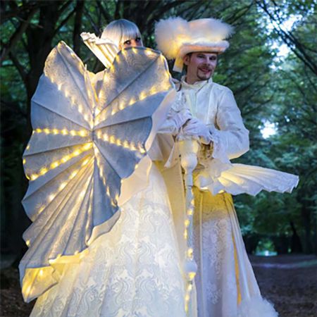 White Luminous Stilt Walkers
