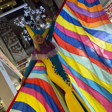 Winged Rainbow Stilt Walkers