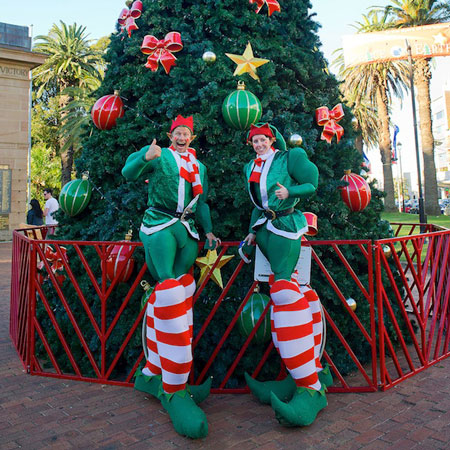 Giant Elf Stilt Walkers