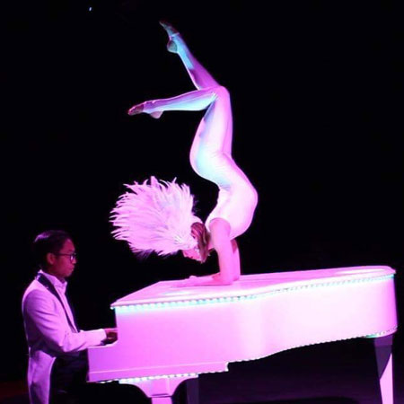 Strolling Piano Contortionist