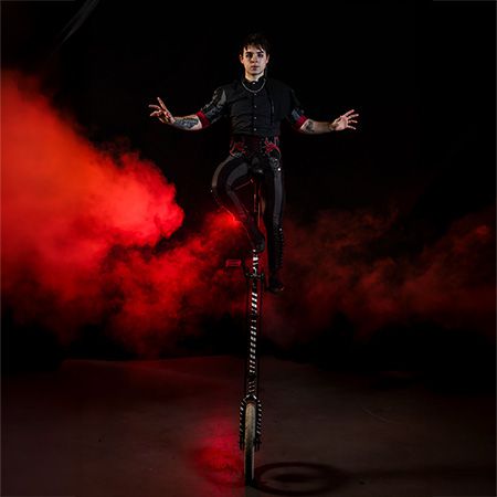 Tall Unicycle Act