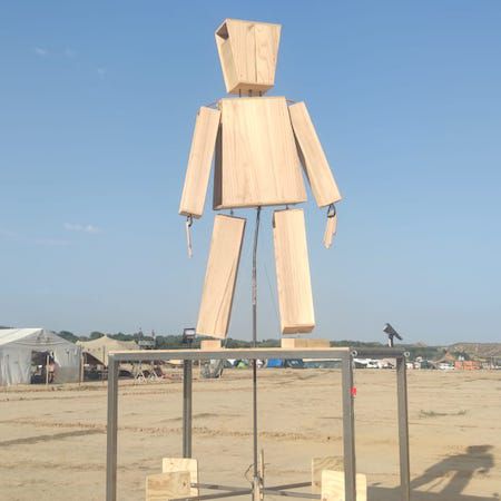 Giant Wooden Puppet Sculpture