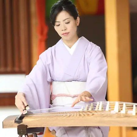 Japanischer Koto-Spieler