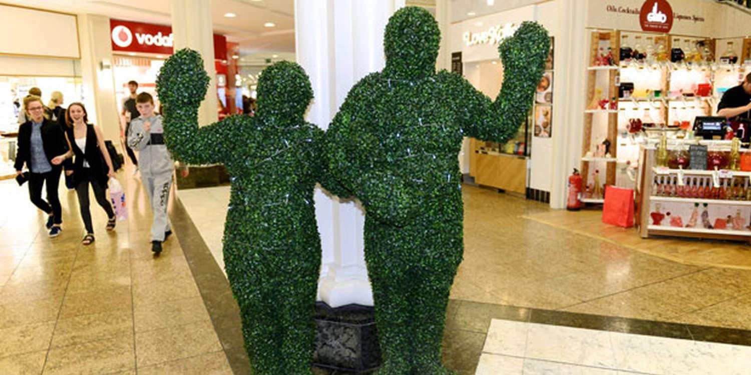 Walkabout Hedge People Keep Shopping Mall Event In The Green