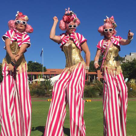Stilt Walking in Pink